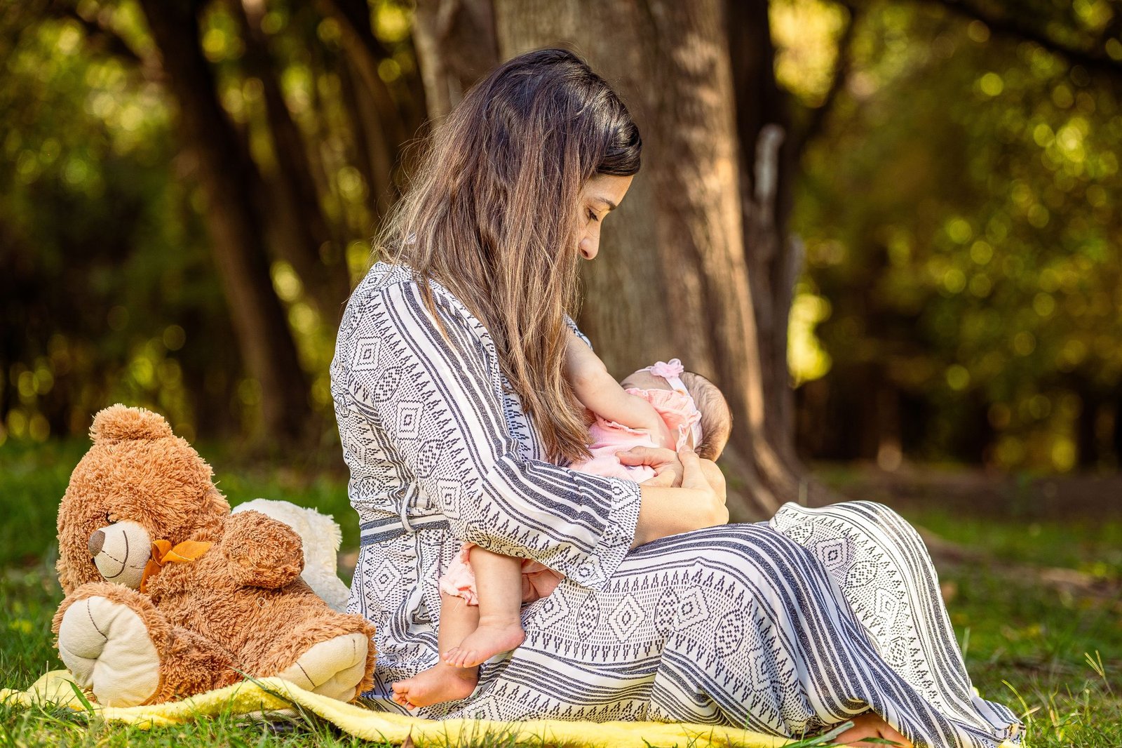 Mum nursing baby outdoors